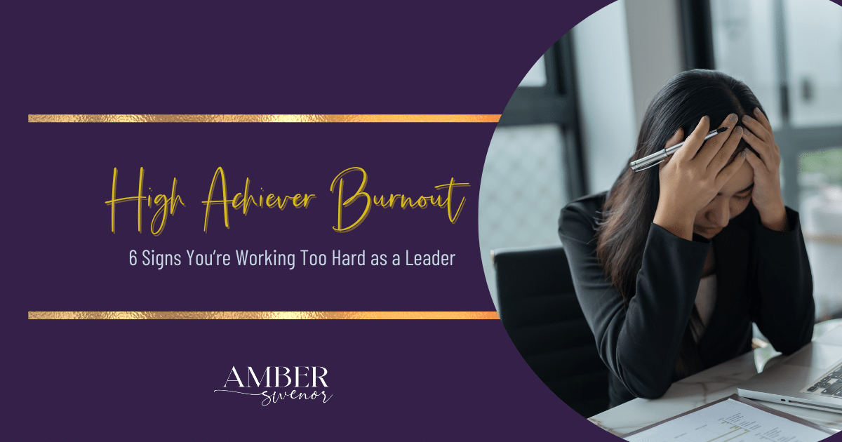 Stressed business woman experiencing high achiever burnout while working at desk in office