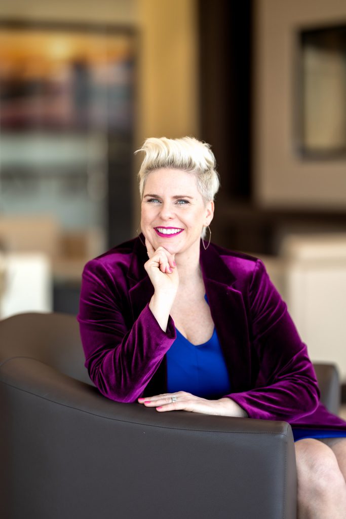 Authentic leadership speaker Amber Swenor smiling in professional headshot