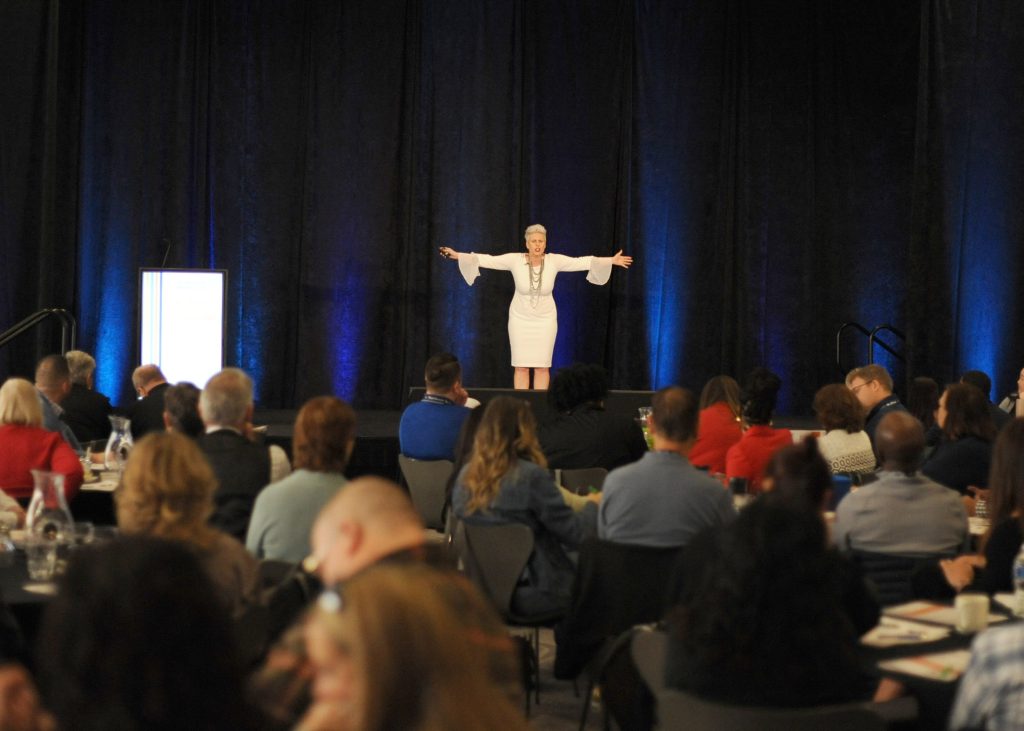 Women’s leadership speaker Amber Swenor leading a keynote session